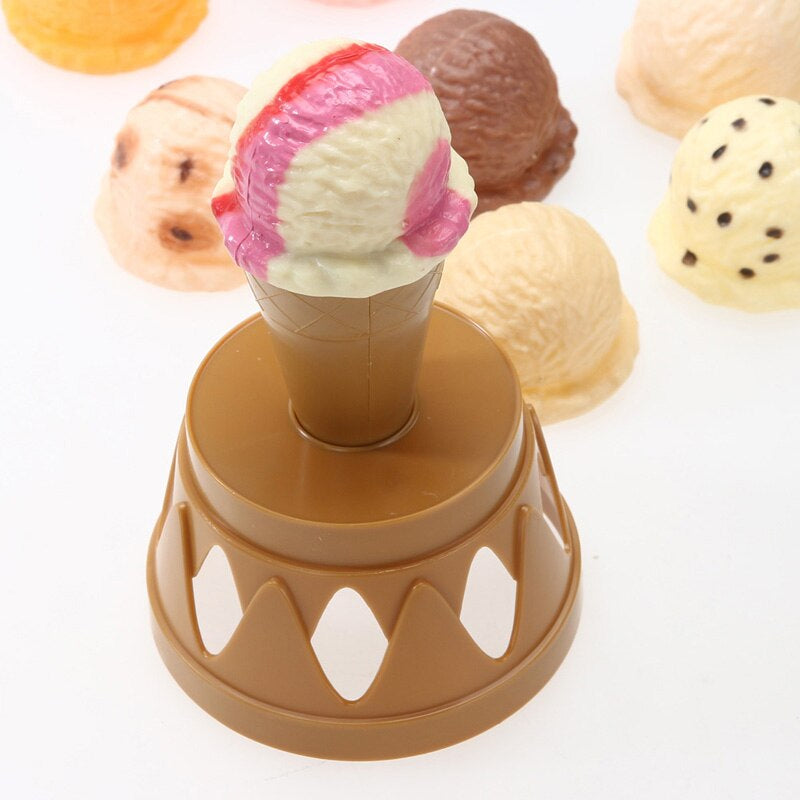 Pink-and-cream toy ice cream in a brown cone and holder, with loose scoops behind it