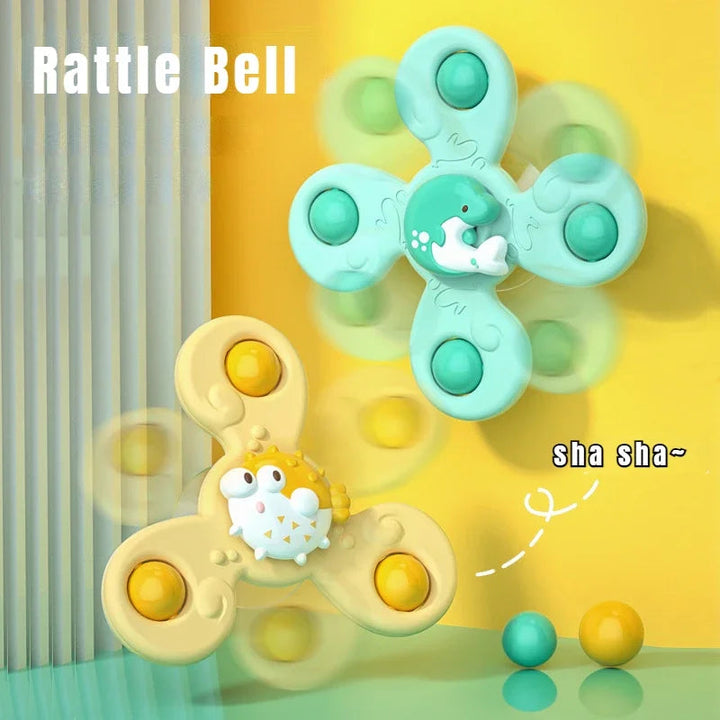 Yellow pufferfish and mint-green dolphin spinners shown with spinning motion effects