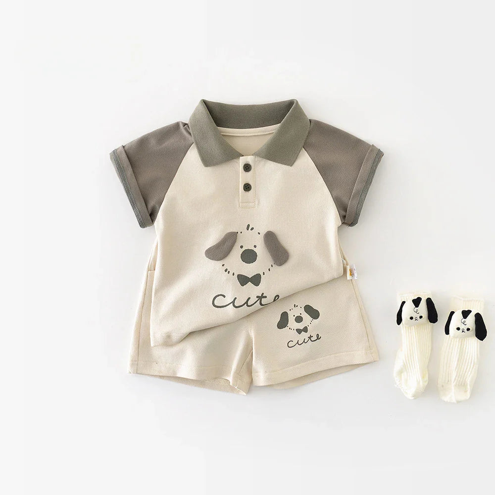 Puppy-print baby polo and matching shorts with ivory dog-detail socks