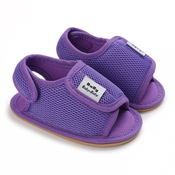 Purple mesh baby sandals showing adjustable front straps and heel loops