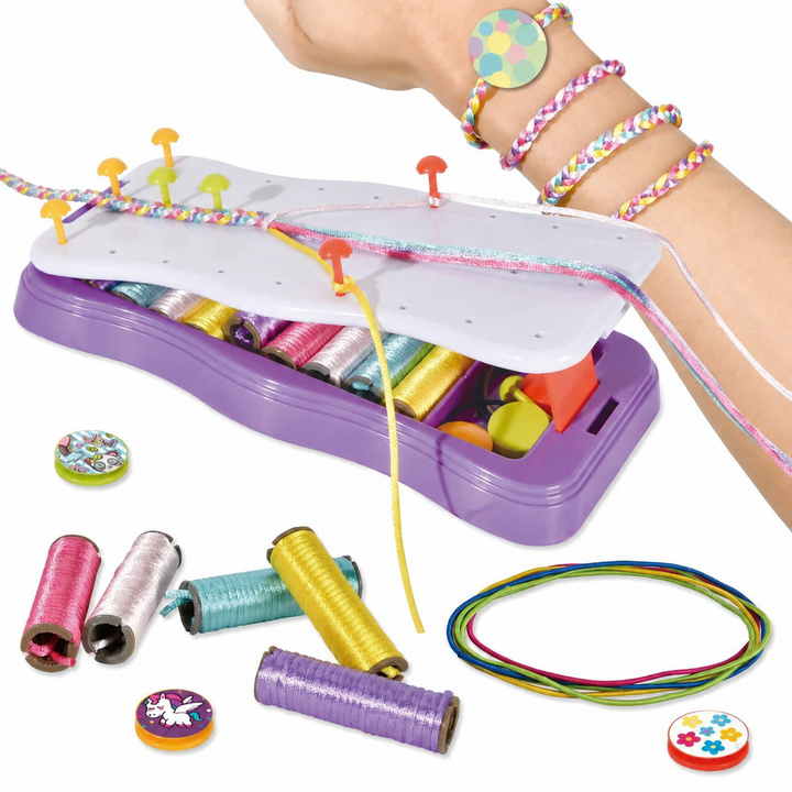 Purple braiding frame with colorful cord spools and finished bracelets on a wrist