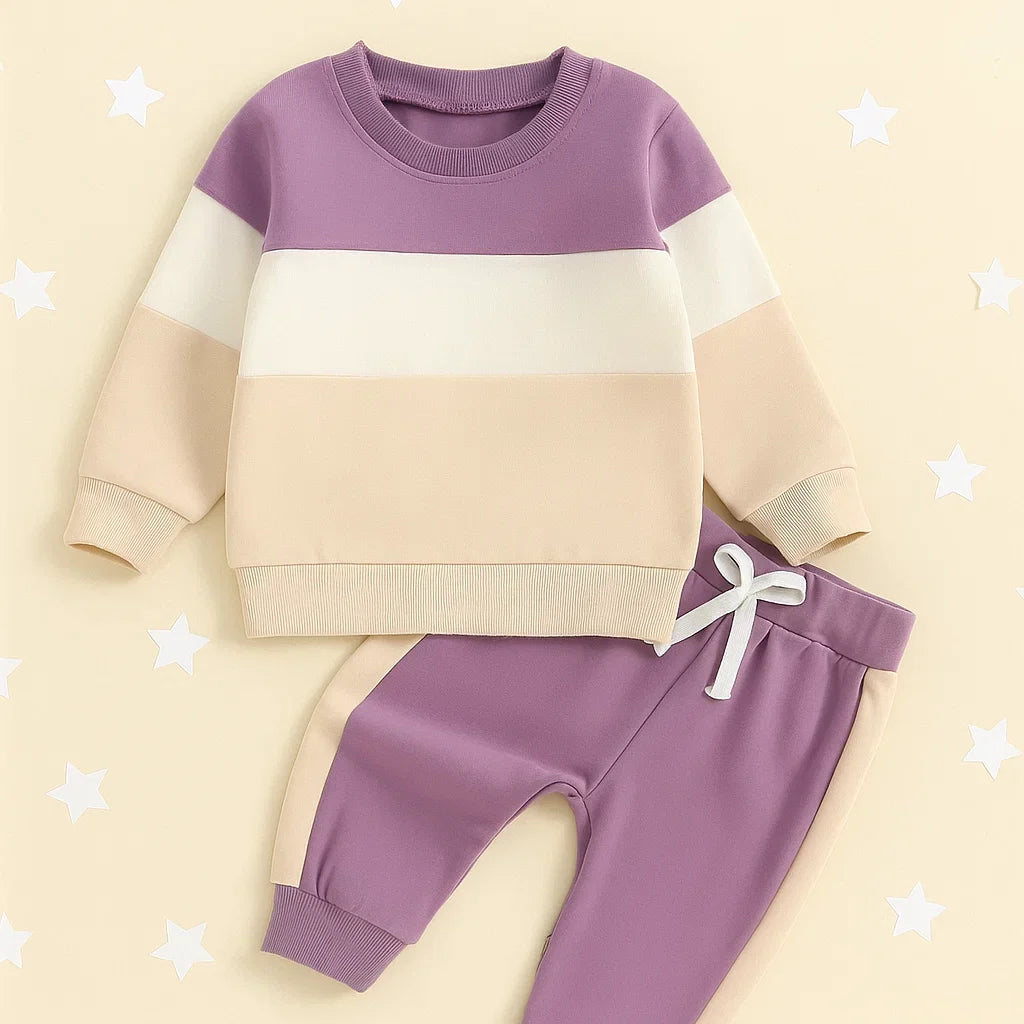 Purple, cream and beige sweatshirt with purple joggers and white waist ties