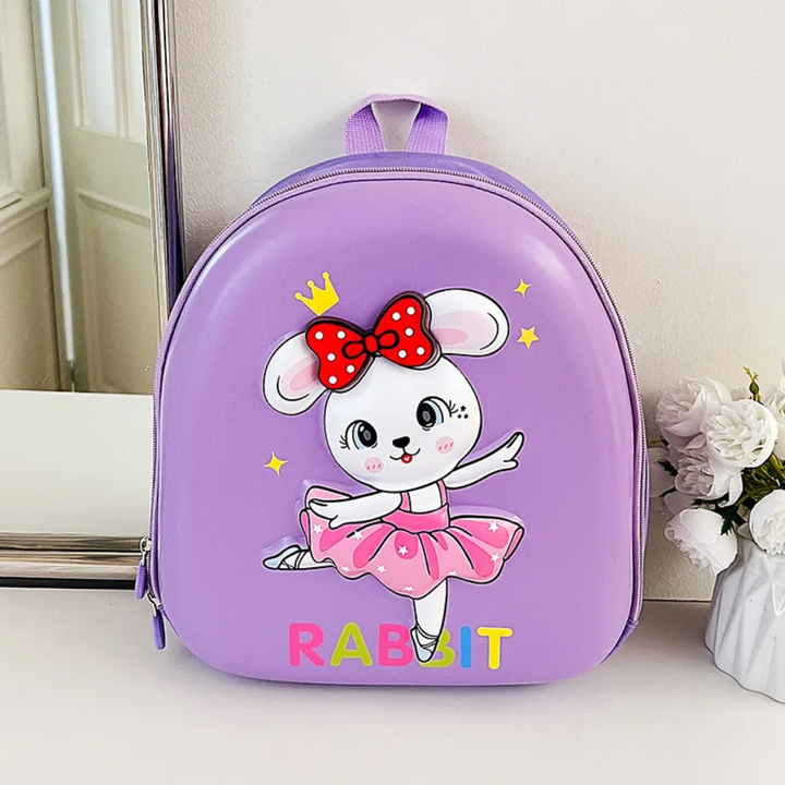 Purple rabbit backpack with a red bow and pink tutu design
