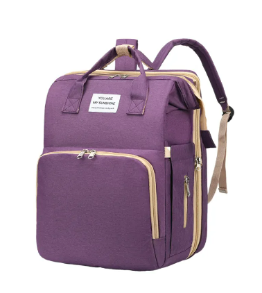 Purple diaper backpack with front zip pocket, top handles and shoulder straps