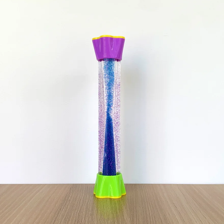 Blue glitter sensory tube with a purple top and green base