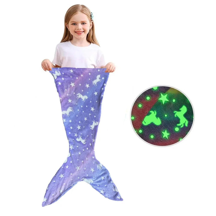 Purple mermaid sleeping bag without side fins, shown with a child and a glowing print detail.