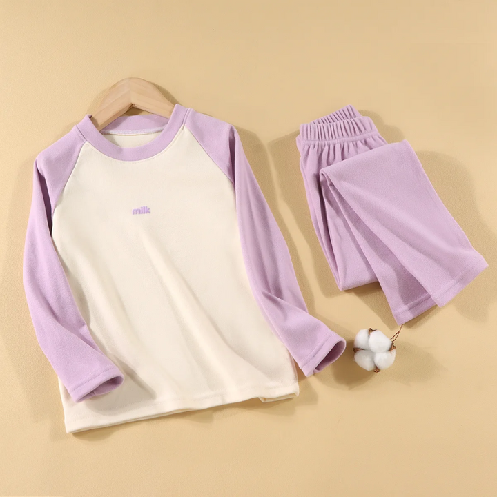 Purple pajama set with a cream-front raglan top and matching elastic-waist pants.
