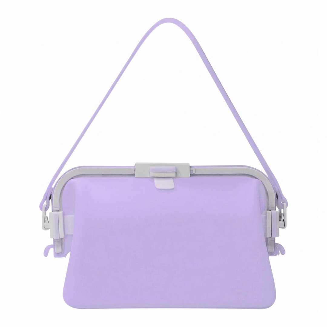 Purple silicone shoulder bag with a lavender strap and light-colored top frame.