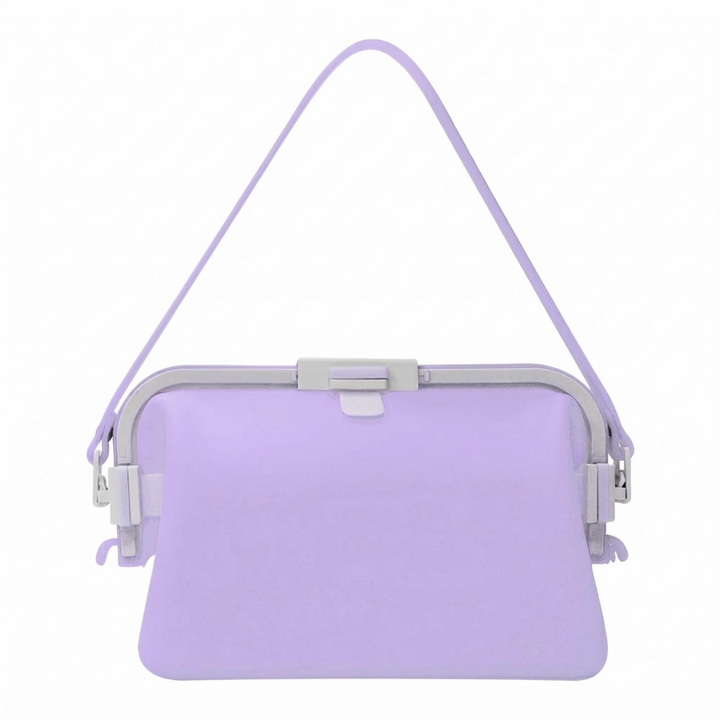 Purple silicone shoulder bag with a lavender strap and light-colored top frame.