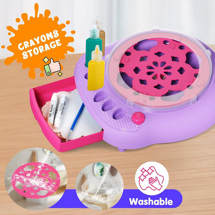 Purple spin painting machine with an open storage drawer holding crayons