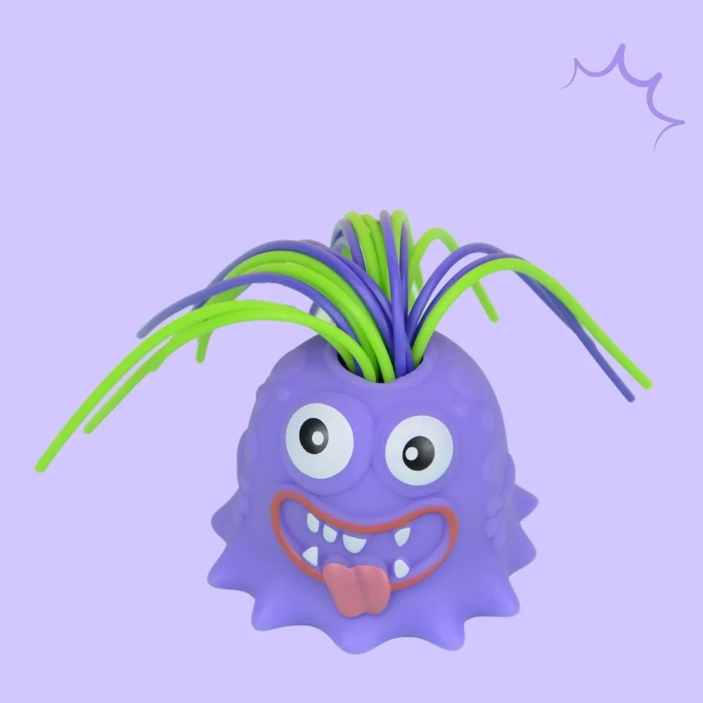 Purple two-eyed monster stress toy with green and purple hair and a tongue-out expression