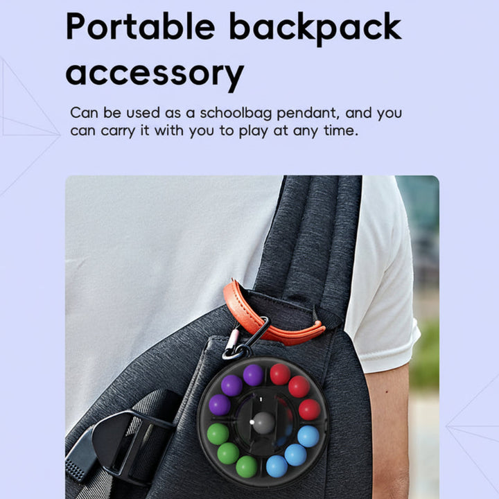 Color-matching puzzle ball clipped to a backpack strap