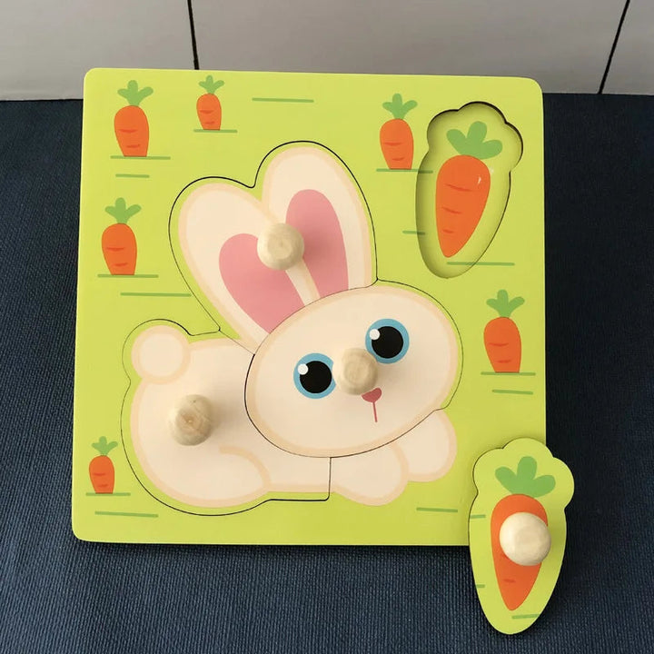 Rabbit wooden peg puzzle with rabbit-shaped pieces and a removable carrot piece