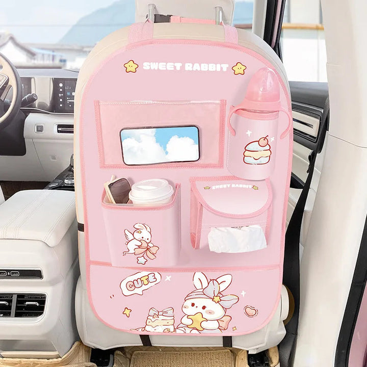 Pink rabbit backseat organizer with a clear device pocket and lower storage compartments