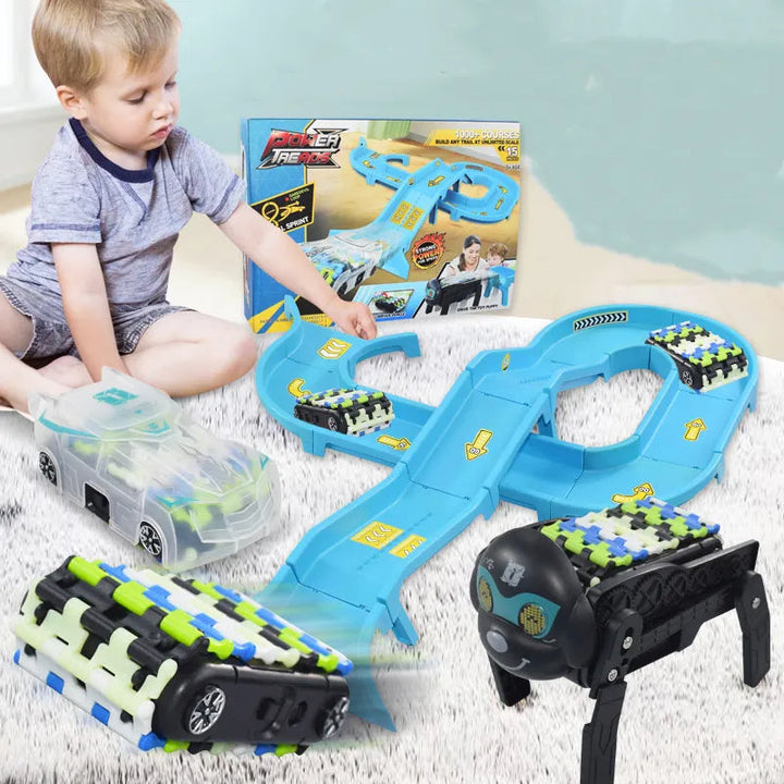 Child playing with the blue race track and toy cars beside the robot dog