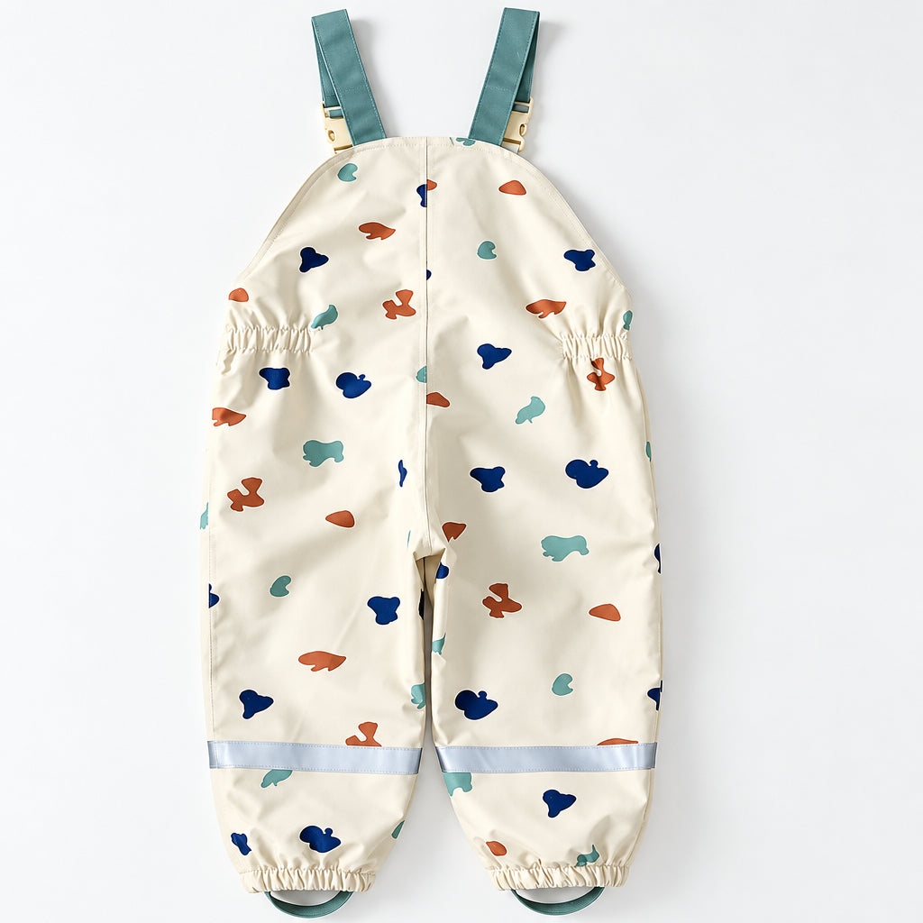 Back view of the printed bib rain pants with gray lower-leg bands.