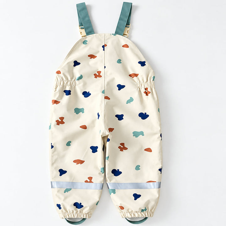 Back view of the printed bib rain pants with gray lower-leg bands.