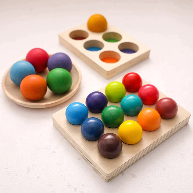Six-ball and twelve-ball wooden sorting boards with colorful balls