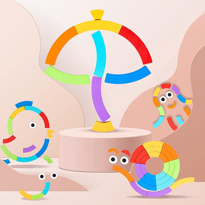 Rainbow puzzle pieces arranged into an umbrella, snail, and colorful characters