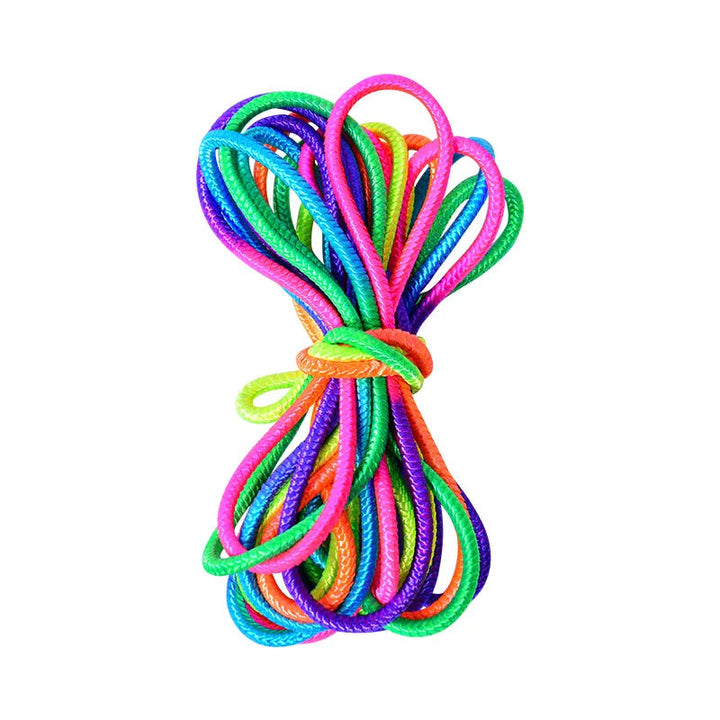 Rainbow elastic jump band folded and tied into a compact bundle