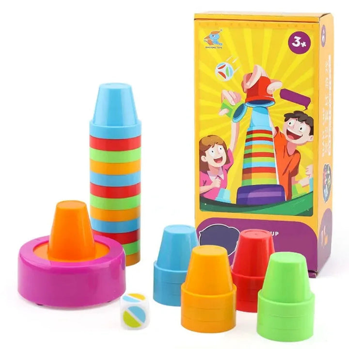Multicolor stacking cup game with a pink base, color die, and yellow box