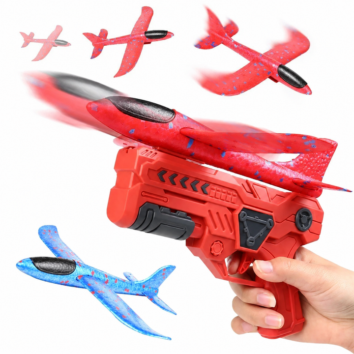 Red handheld airplane launcher with red and blue foam planes in a flight demonstration