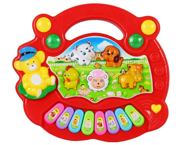 Red animal toy piano with a carrying handle, animal-shaped buttons, and colorful keys.