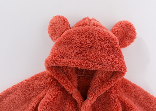 Close-up of the red fleece baby romper&
