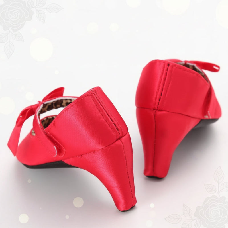 Back view of red baby dress shoes showing the heel shape and stitching