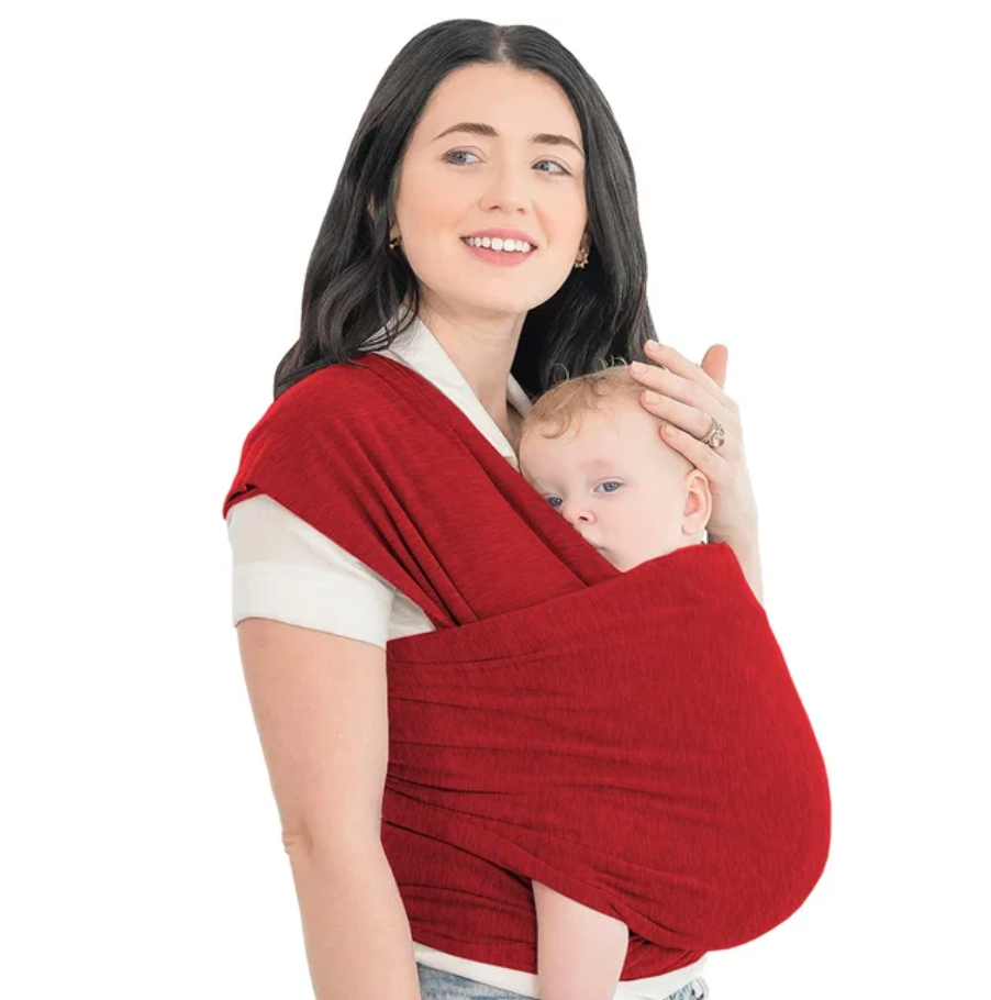 Red baby wrap worn across a parent&