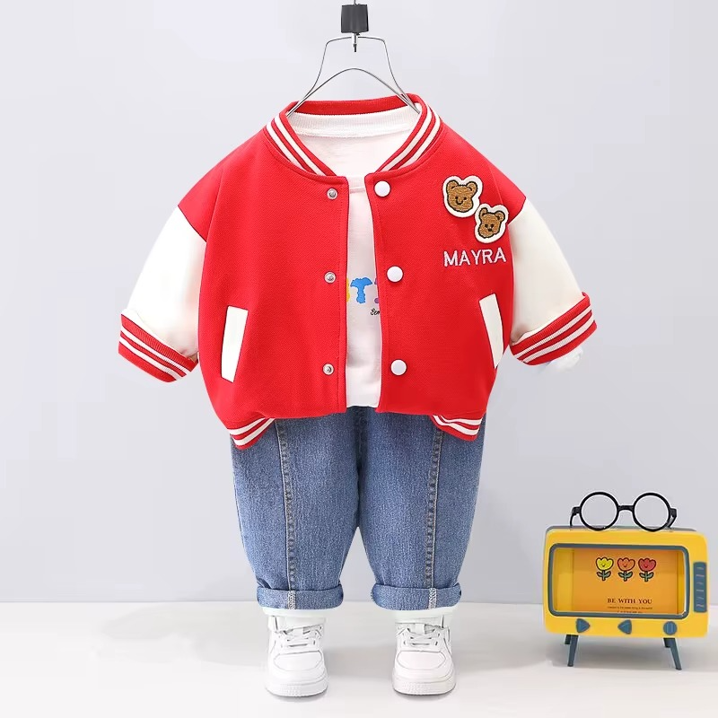 Red-and-cream varsity jacket with bear patches, a white T-shirt, and blue jeans