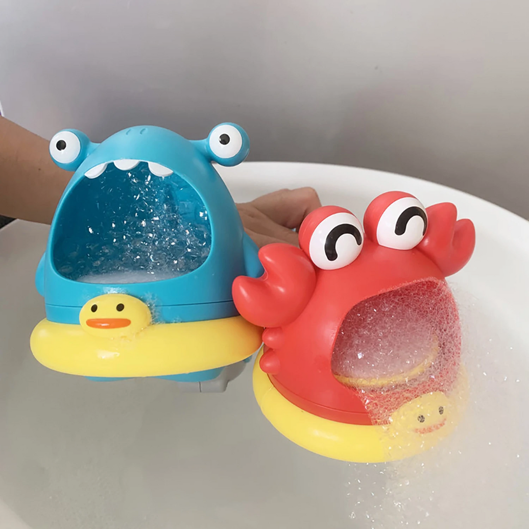 Red crab and blue monster bubble bath toys held over a bathtub with foam at their mouths