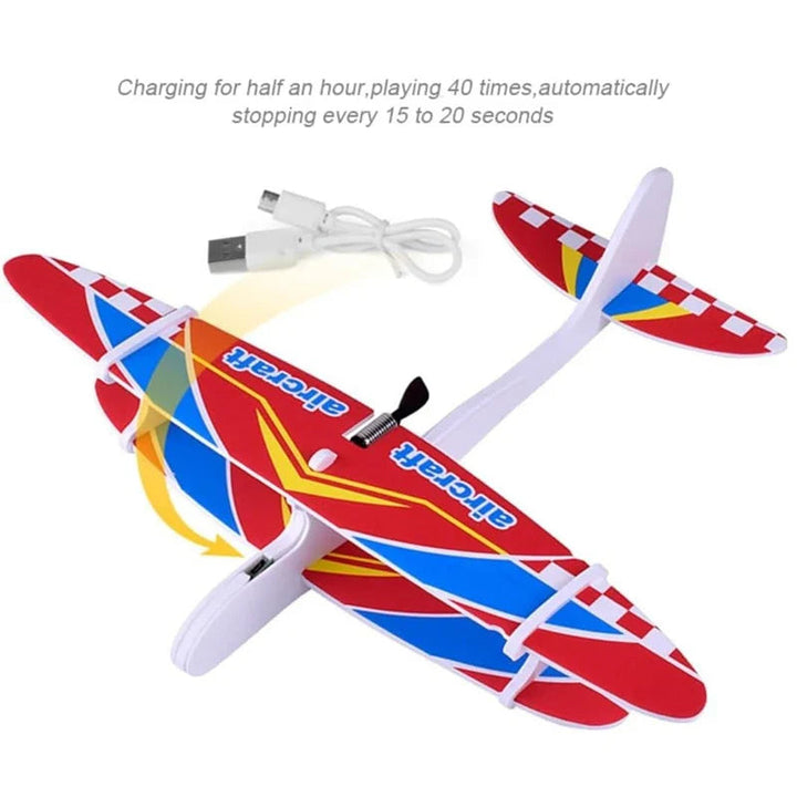 Red, white, and blue foam propeller airplane beside a USB charging cable