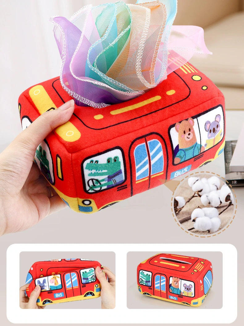 Red bus tissue box held in one hand, with colorful fabric tissues and close-up views