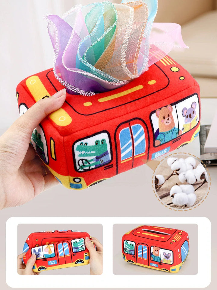 Red bus tissue box held in one hand, with colorful fabric tissues and close-up views