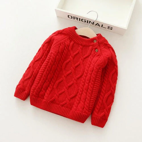 Red cable-knit sweater with a round neck, ribbed edges, and two shoulder buttons.