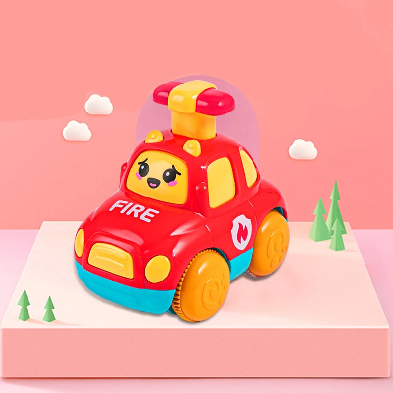 Red toy fire vehicle with yellow wheels, a roof-mounted button, and a cartoon windshield face.