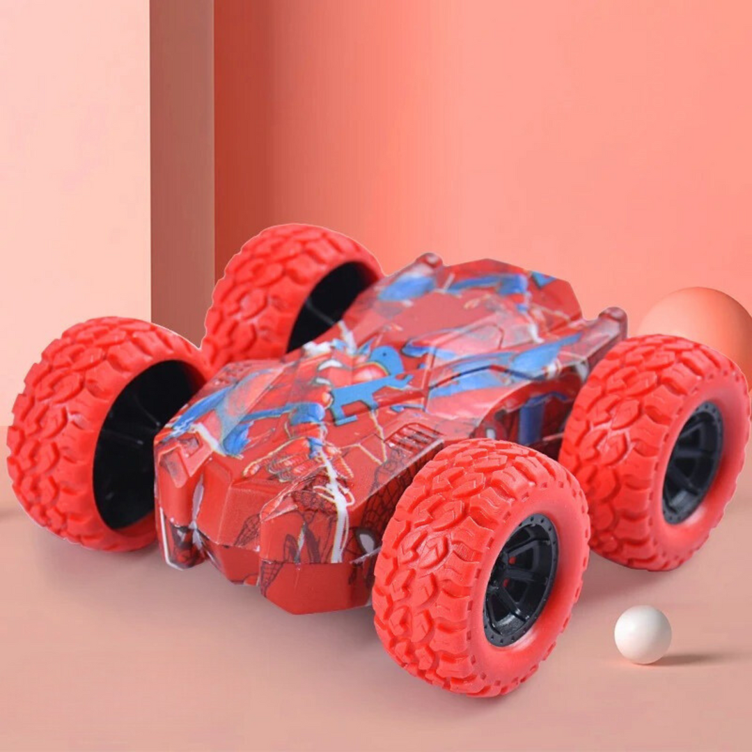 Red toy car with textured red wheels and blue body graphics on a red background.