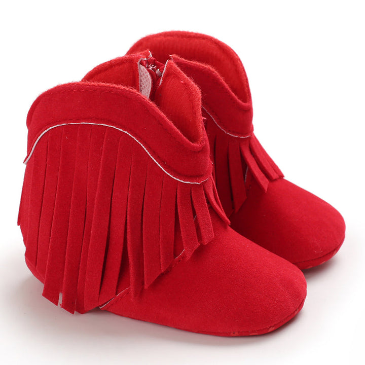 Red baby cowboy boots with fringe trim and rounded toes