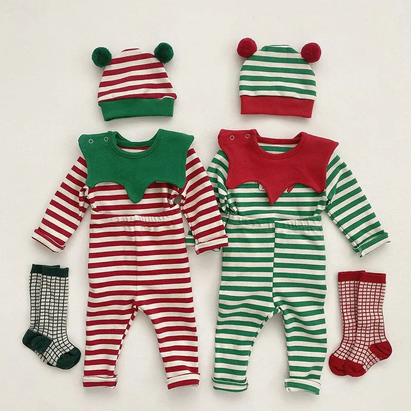 Red and green striped baby Christmas outfits with matching pom-pom hats and patterned socks