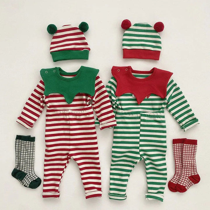 Red and green striped baby Christmas outfits with matching pom-pom hats and patterned socks