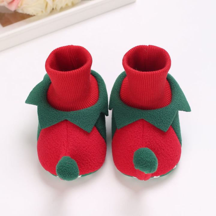 Red and green elf-style baby slippers with ribbed cuffs and green pom-poms