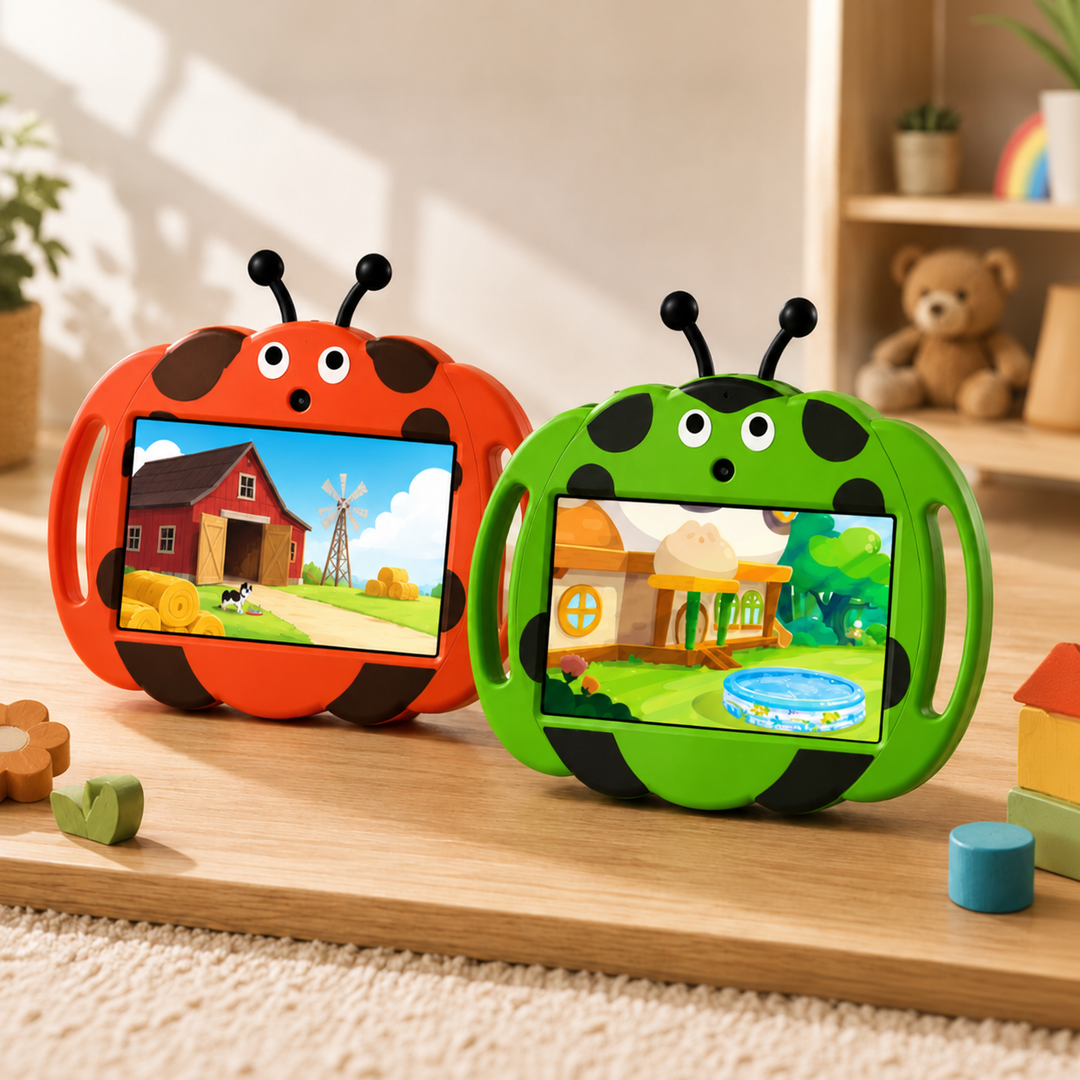 Red and green kids' tablets in ladybug-shaped silicone cases on a playroom table
