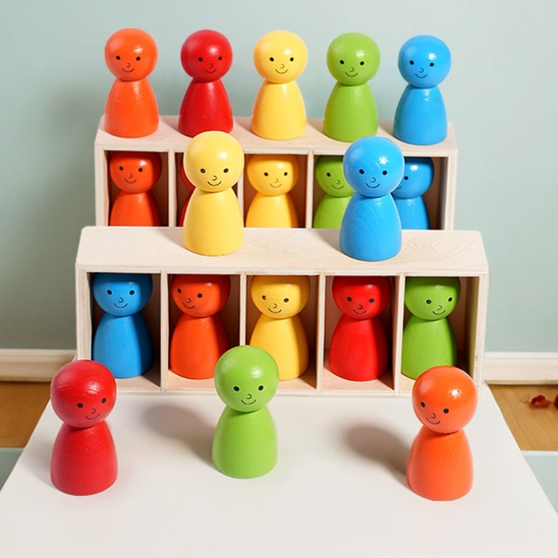 Red, green, and orange figures in front of two wooden color-matching racks