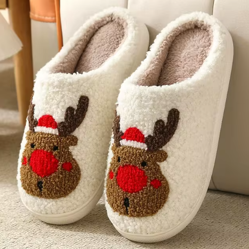 Cream slippers with red-nosed reindeer wearing red Santa hats.