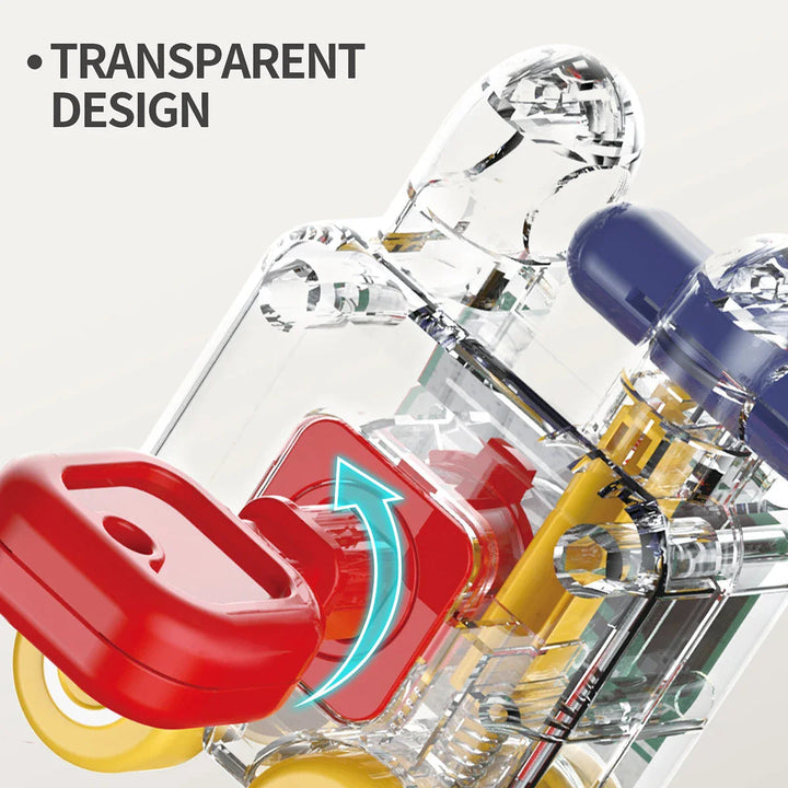 Close-up of a red key inserted into a transparent vehicle lock toy
