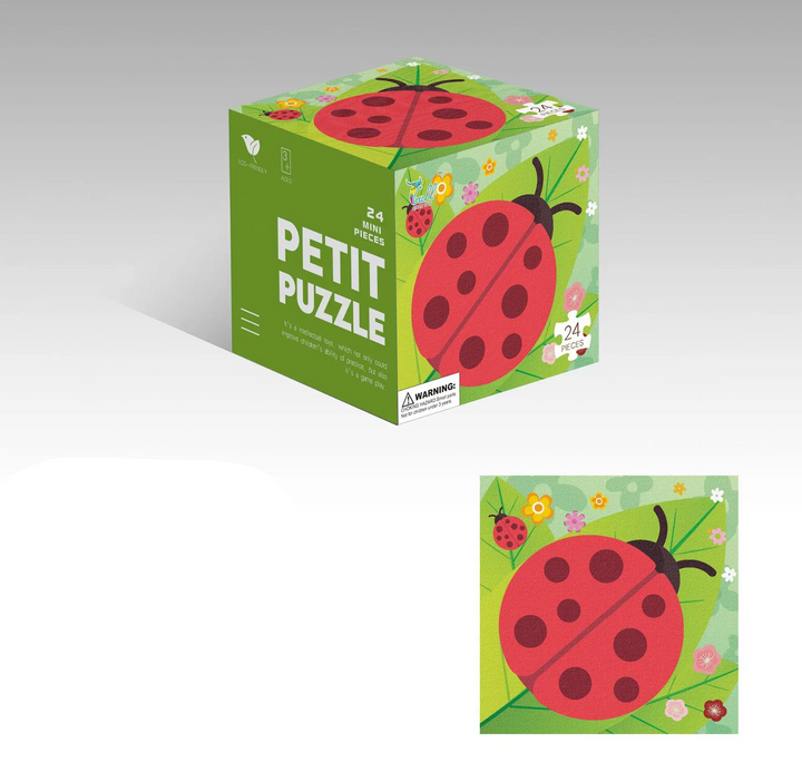 Ladybug jigsaw puzzle with a red-and-black insect and a matching green cube box