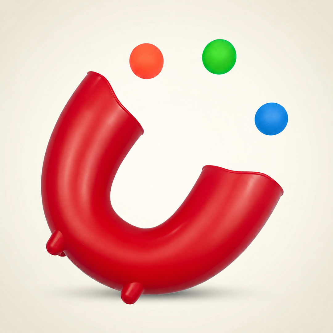 Red U-shaped ball skills tube shown with orange, green, and blue balls