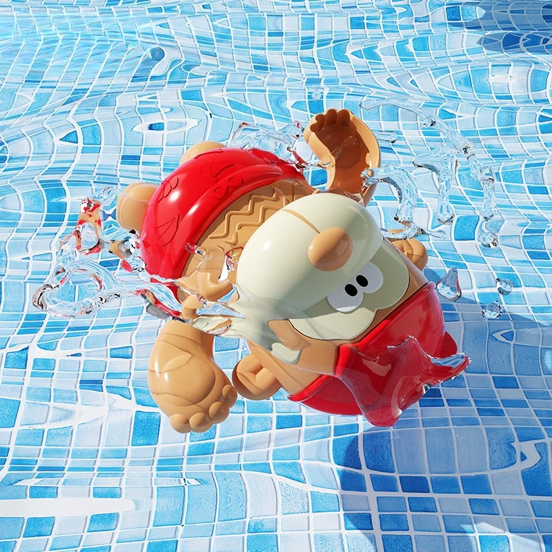Red wind-up monkey bath toy tilted in blue-tiled pool water