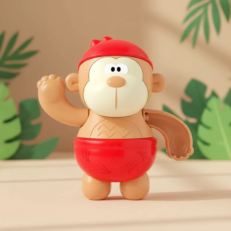 Red monkey bath toy standing upright with a matching swim cap and raised arm